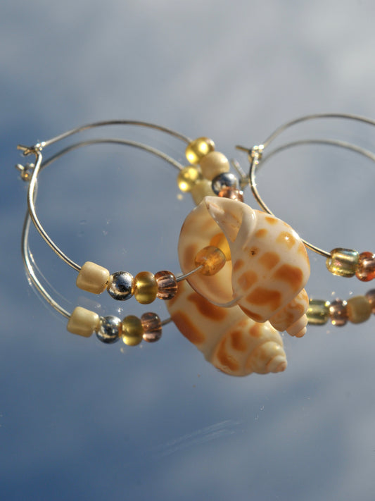 Silver spotted conch earrings