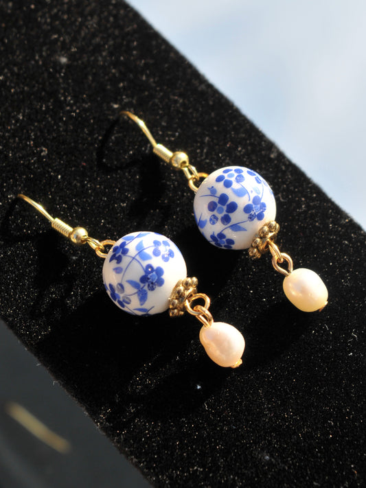 Gold floral bead dangle earrings